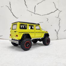 Load image into Gallery viewer, Mercedes G Wagon G500 Uplifted Yellow Metal Diecast Car 1:32 (14x5 cm)